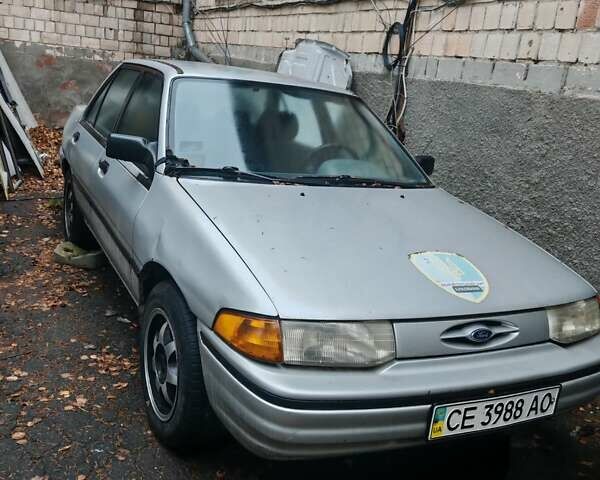 Серый Форд Эскорт, объемом двигателя 1.9 л и пробегом 300 тыс. км за 600 $, фото 1 на Automoto.ua