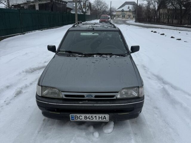 Серый Форд Эскорт, объемом двигателя 1.4 л и пробегом 200 тыс. км за 600 $, фото 1 на Automoto.ua