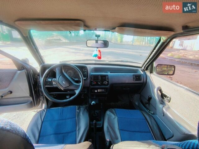 Синий Форд Эскорт, объемом двигателя 1.6 л и пробегом 70 тыс. км за 1300 $, фото 1 на Automoto.ua