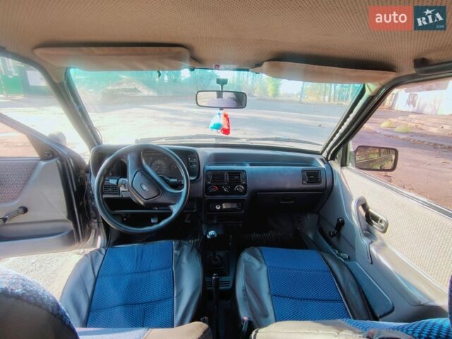 Синий Форд Эскорт, объемом двигателя 1.6 л и пробегом 70 тыс. км за 1300 $, фото 1 на Automoto.ua