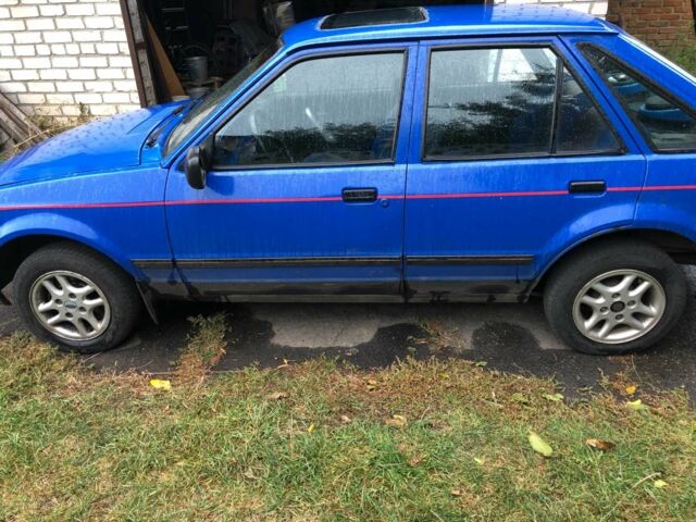 Синий Форд Эскорт, объемом двигателя 1.4 л и пробегом 400 тыс. км за 990 $, фото 1 на Automoto.ua