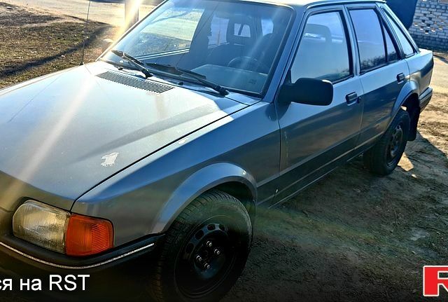 Синий Форд Эскорт, объемом двигателя 1.3 л и пробегом 0 тыс. км за 1000 $, фото 1 на Automoto.ua