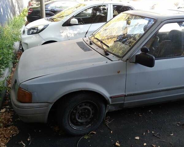 Синий Форд Эскорт, объемом двигателя 1.3 л и пробегом 500 тыс. км за 550 $, фото 1 на Automoto.ua