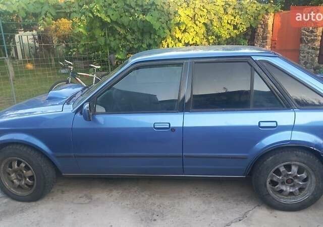 Синий Форд Эскорт, объемом двигателя 1.4 л и пробегом 200 тыс. км за 1400 $, фото 1 на Automoto.ua