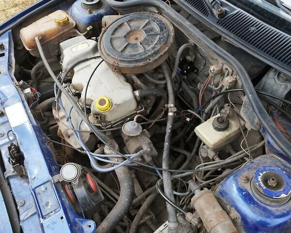 Синий Форд Эскорт, объемом двигателя 1.58 л и пробегом 200 тыс. км за 903 $, фото 1 на Automoto.ua