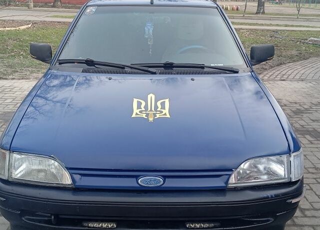 Синий Форд Эскорт, объемом двигателя 1.3 л и пробегом 300 тыс. км за 1300 $, фото 1 на Automoto.ua