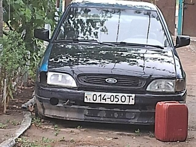 Синий Форд Эскорт, объемом двигателя 2 л и пробегом 100 тыс. км за 429 $, фото 1 на Automoto.ua