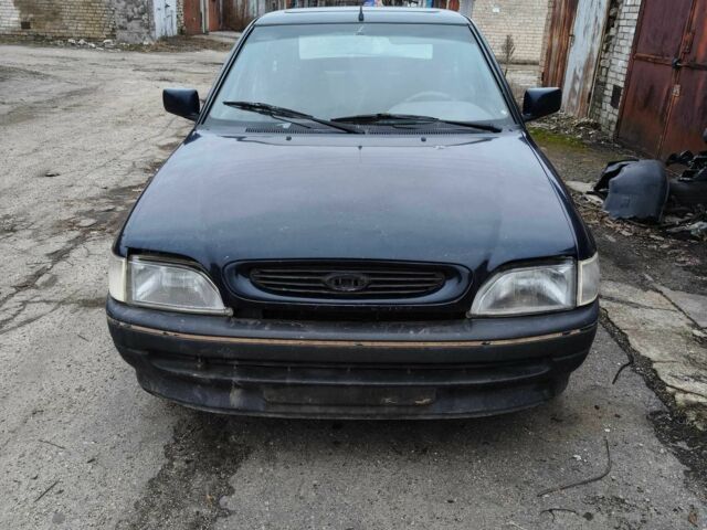 Синий Форд Эскорт, объемом двигателя 1.6 л и пробегом 200 тыс. км за 600 $, фото 1 на Automoto.ua