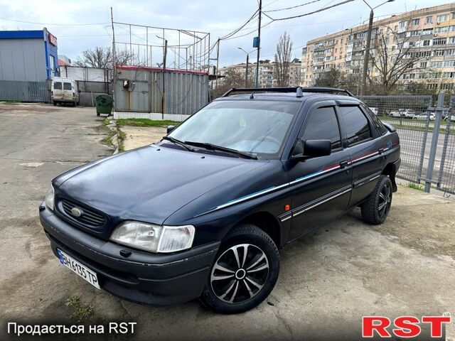 Синий Форд Эскорт, объемом двигателя 1.4 л и пробегом 250 тыс. км за 1150 $, фото 1 на Automoto.ua