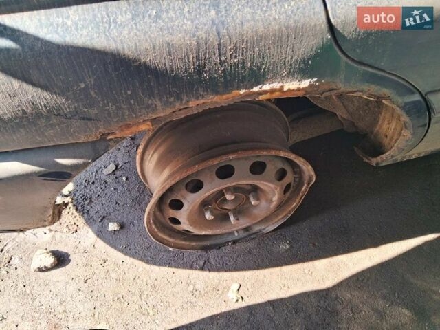 Синий Форд Эскорт, объемом двигателя 1.6 л и пробегом 100 тыс. км за 700 $, фото 1 на Automoto.ua