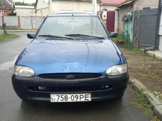 Синий Форд Эскорт, объемом двигателя 1 л и пробегом 246 тыс. км за 700 $, фото 1 на Automoto.ua