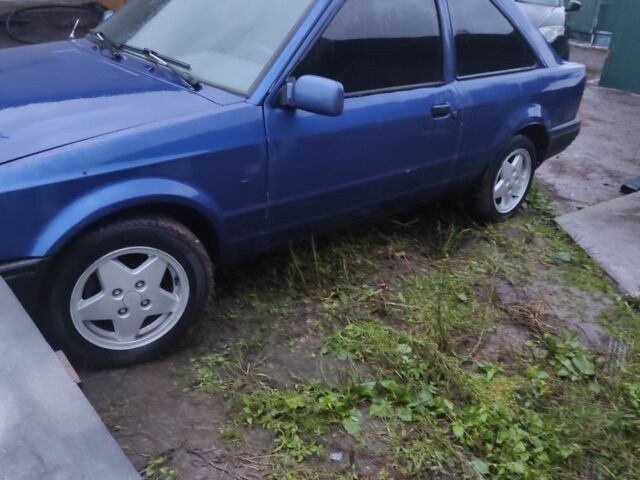 Синий Форд Эскорт, объемом двигателя 0 л и пробегом 124 тыс. км за 750 $, фото 1 на Automoto.ua