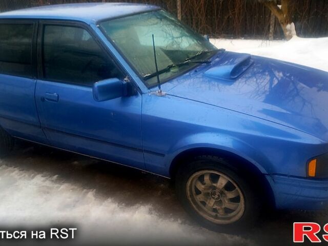 Синий Форд Эскорт, объемом двигателя 1.4 л и пробегом 300 тыс. км за 1390 $, фото 1 на Automoto.ua