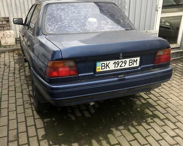 Синій Форд Ескорт, об'ємом двигуна 1.39 л та пробігом 100 тис. км за 1250 $, фото 1 на Automoto.ua