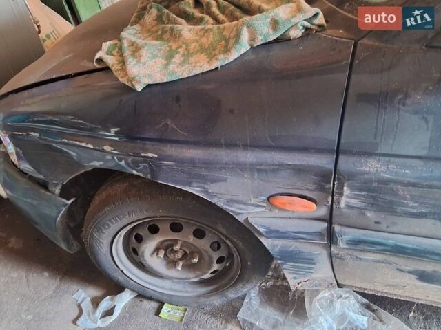 Синій Форд Ескорт, об'ємом двигуна 1.4 л та пробігом 500 тис. км за 700 $, фото 1 на Automoto.ua