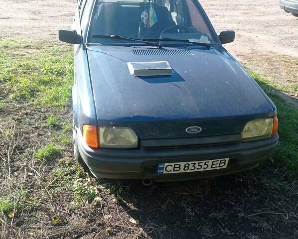 Синий Форд Эскорт, объемом двигателя 1.3 л и пробегом 200 тыс. км за 650 $, фото 1 на Automoto.ua