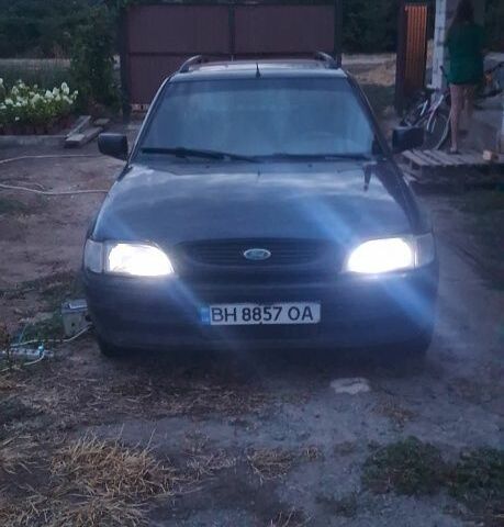 Синій Форд Ескорт, об'ємом двигуна 1.6 л та пробігом 1 тис. км за 800 $, фото 1 на Automoto.ua