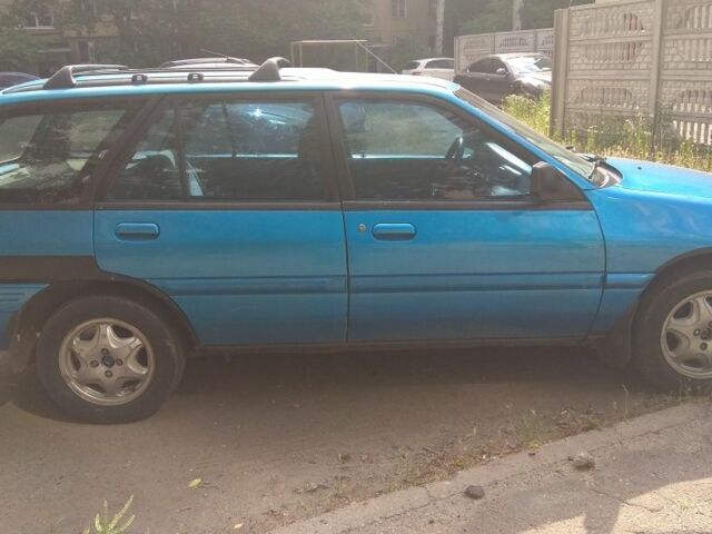 Синий Форд Эскорт, объемом двигателя 2 л и пробегом 289 тыс. км за 1928 $, фото 1 на Automoto.ua