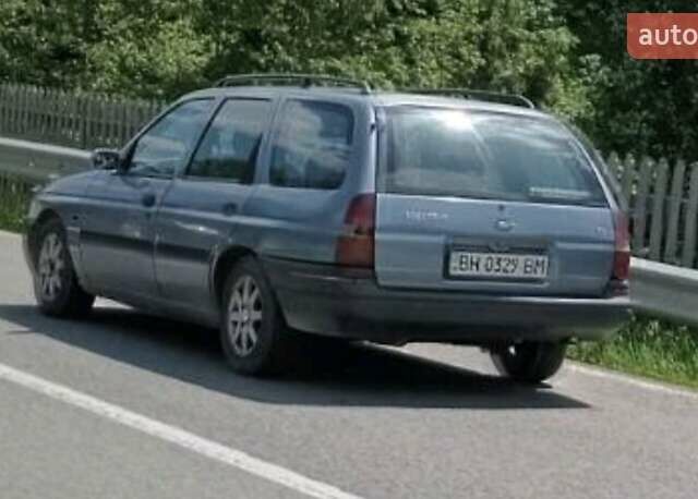 Синий Форд Эскорт, объемом двигателя 1.8 л и пробегом 500 тыс. км за 1100 $, фото 1 на Automoto.ua