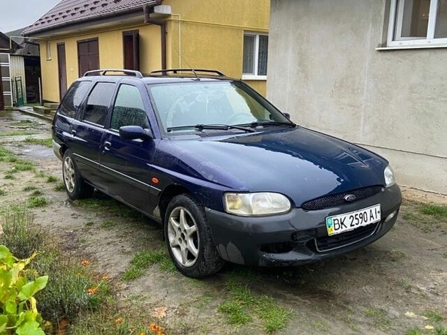 Синий Форд Эскорт, объемом двигателя 1.8 л и пробегом 250 тыс. км за 950 $, фото 1 на Automoto.ua
