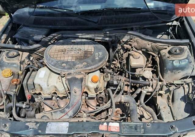 Зеленый Форд Эскорт, объемом двигателя 1.4 л и пробегом 500 тыс. км за 1800 $, фото 1 на Automoto.ua