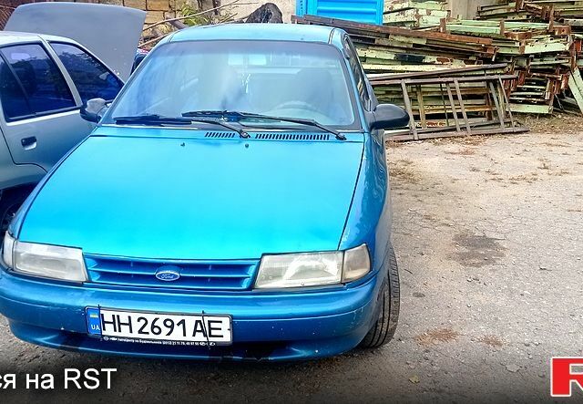 Зеленый Форд Эскорт, объемом двигателя 1.6 л и пробегом 222 тыс. км за 1000 $, фото 1 на Automoto.ua