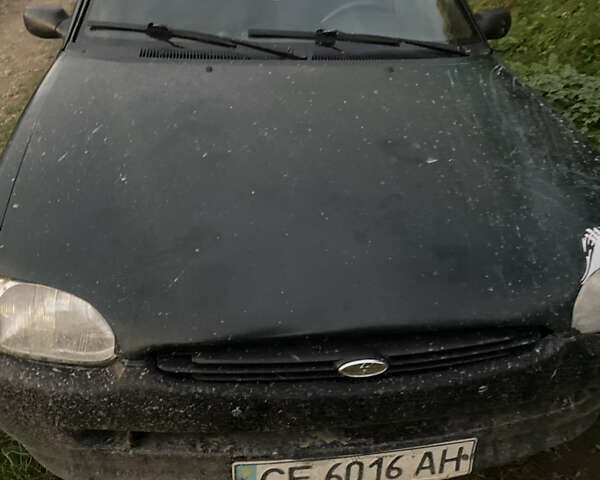 Зеленый Форд Эскорт, объемом двигателя 1.6 л и пробегом 210 тыс. км за 900 $, фото 1 на Automoto.ua