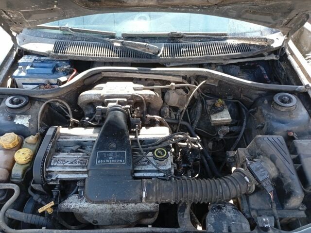 Зелений Форд Ескорт, об'ємом двигуна 2 л та пробігом 230 тис. км за 339 $, фото 1 на Automoto.ua