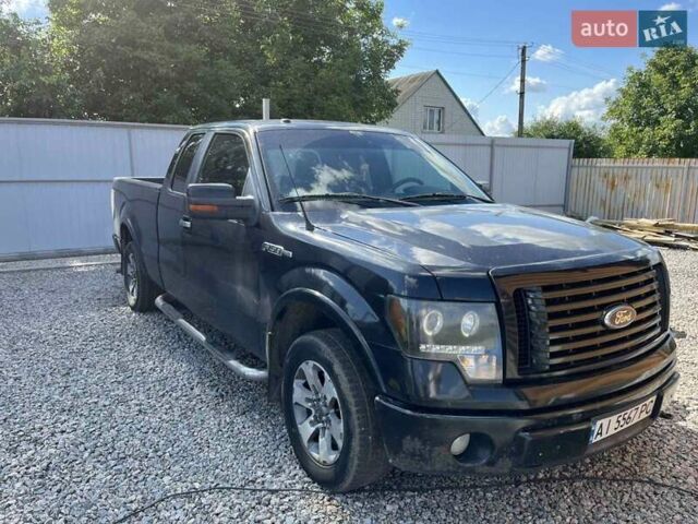 Черный Форд Ф-150, объемом двигателя 4.6 л и пробегом 230 тыс. км за 12000 $, фото 1 на Automoto.ua