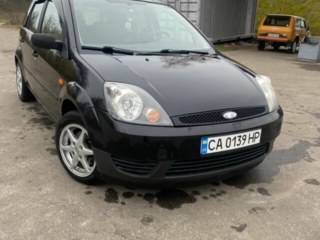 Черный Форд Фиеста, объемом двигателя 1.4 л и пробегом 160 тыс. км за 3600 $, фото 1 на Automoto.ua