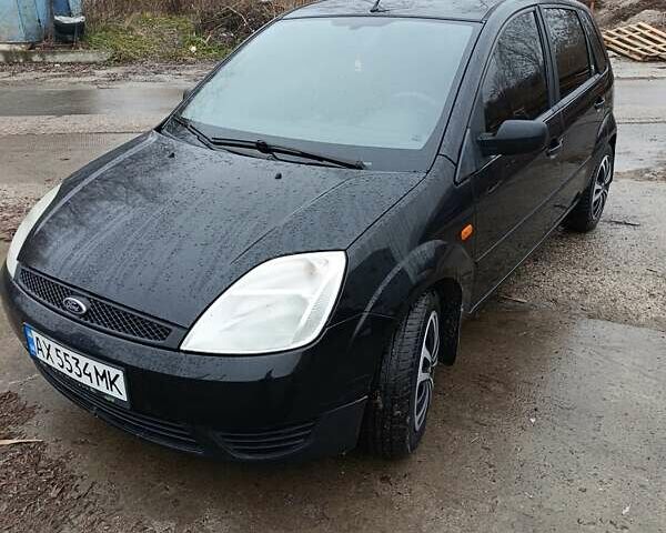 Черный Форд Фиеста, объемом двигателя 1.3 л и пробегом 164 тыс. км за 3900 $, фото 1 на Automoto.ua