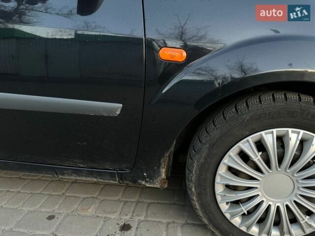 Черный Форд Фиеста, объемом двигателя 1.4 л и пробегом 298 тыс. км за 3200 $, фото 1 на Automoto.ua
