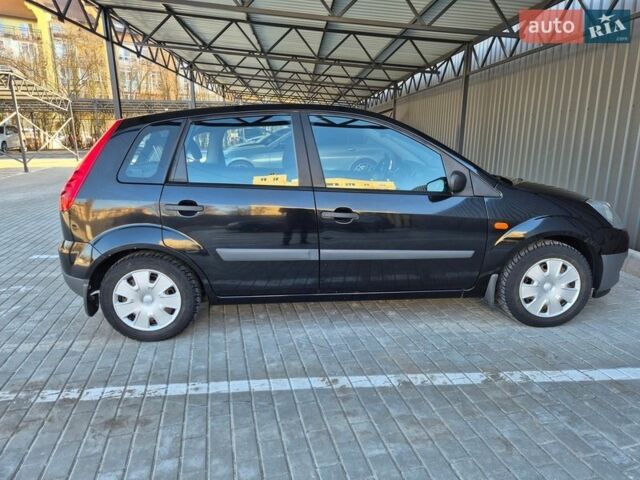 Черный Форд Фиеста, объемом двигателя 1.4 л и пробегом 202 тыс. км за 3000 $, фото 1 на Automoto.ua