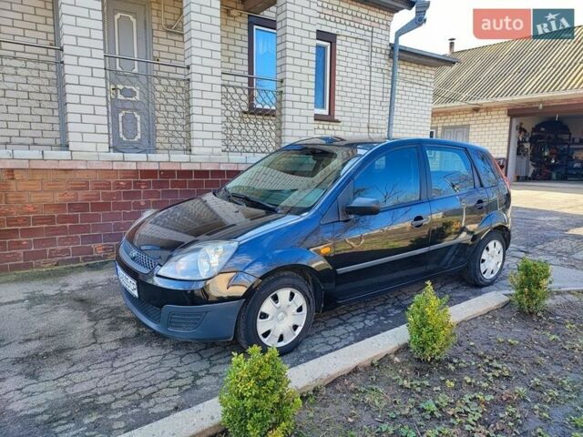 Черный Форд Фиеста, объемом двигателя 1.39 л и пробегом 210 тыс. км за 3970 $, фото 1 на Automoto.ua