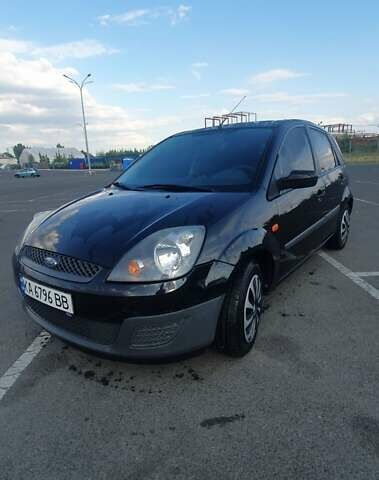 Черный Форд Фиеста, объемом двигателя 1.25 л и пробегом 152 тыс. км за 4600 $, фото 1 на Automoto.ua