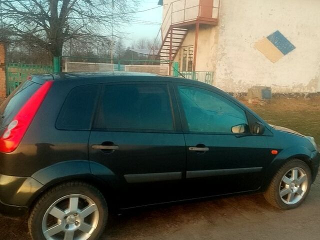 Чорний Форд Фієста, об'ємом двигуна 1.4 л та пробігом 320 тис. км за 3500 $, фото 1 на Automoto.ua