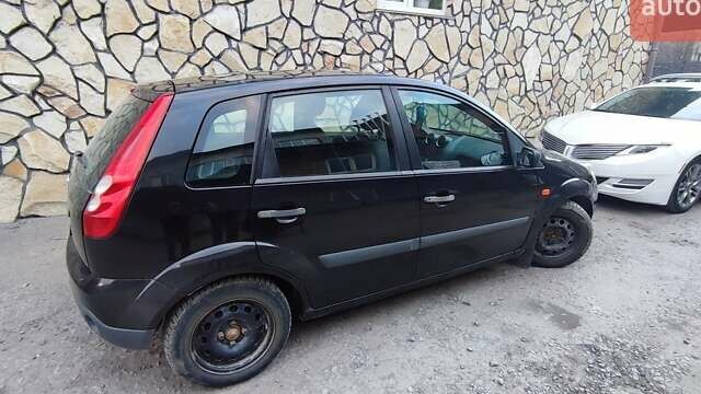 Черный Форд Фиеста, объемом двигателя 1.4 л и пробегом 170 тыс. км за 3800 $, фото 1 на Automoto.ua