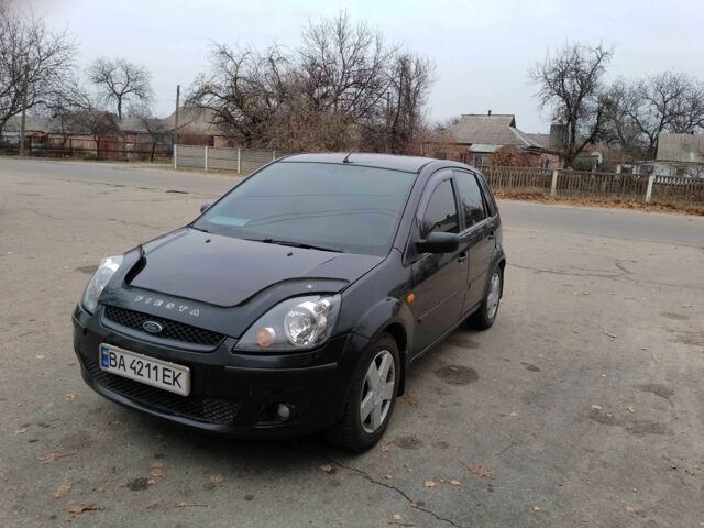 Черный Форд Фиеста, объемом двигателя 1.4 л и пробегом 233 тыс. км за 4200 $, фото 1 на Automoto.ua
