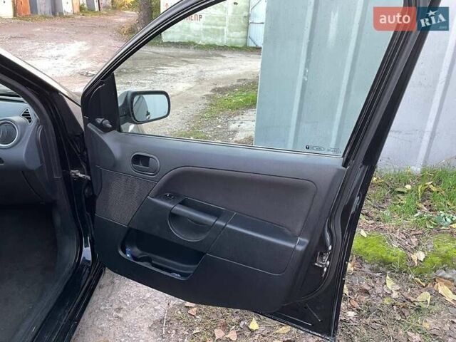 Черный Форд Фиеста, объемом двигателя 1.25 л и пробегом 117 тыс. км за 4500 $, фото 1 на Automoto.ua