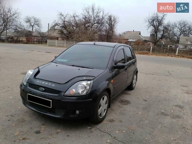 Черный Форд Фиеста, объемом двигателя 1.4 л и пробегом 233 тыс. км за 3900 $, фото 1 на Automoto.ua