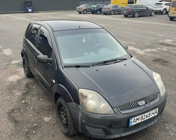 Черный Форд Фиеста, объемом двигателя 1.39 л и пробегом 337 тыс. км за 2600 $, фото 1 на Automoto.ua