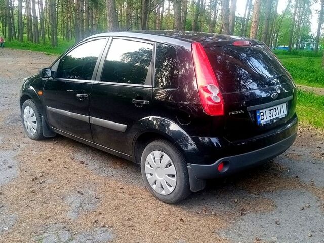 Черный Форд Фиеста, объемом двигателя 1.2 л и пробегом 171 тыс. км за 3350 $, фото 1 на Automoto.ua