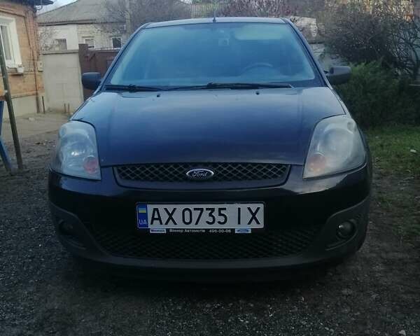 Черный Форд Фиеста, объемом двигателя 1.4 л и пробегом 204 тыс. км за 3900 $, фото 1 на Automoto.ua