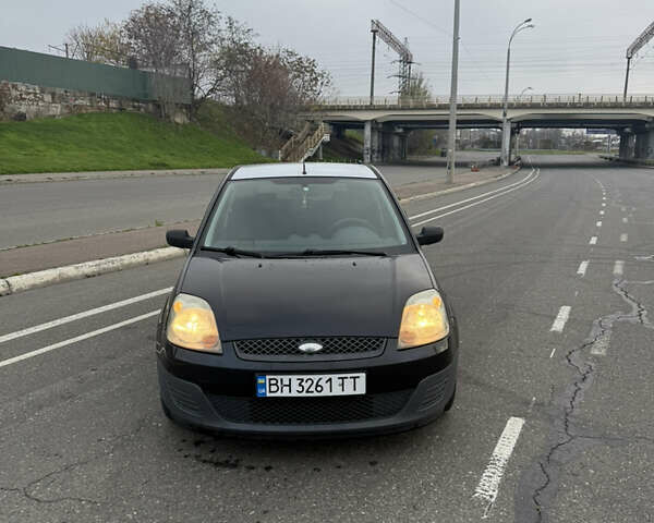 Черный Форд Фиеста, объемом двигателя 1.25 л и пробегом 116 тыс. км за 3800 $, фото 1 на Automoto.ua