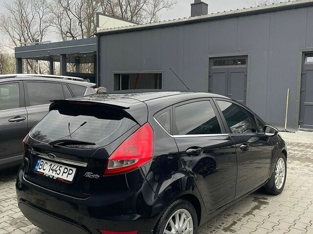 Черный Форд Фиеста, объемом двигателя 1.4 л и пробегом 260 тыс. км за 5770 $, фото 1 на Automoto.ua