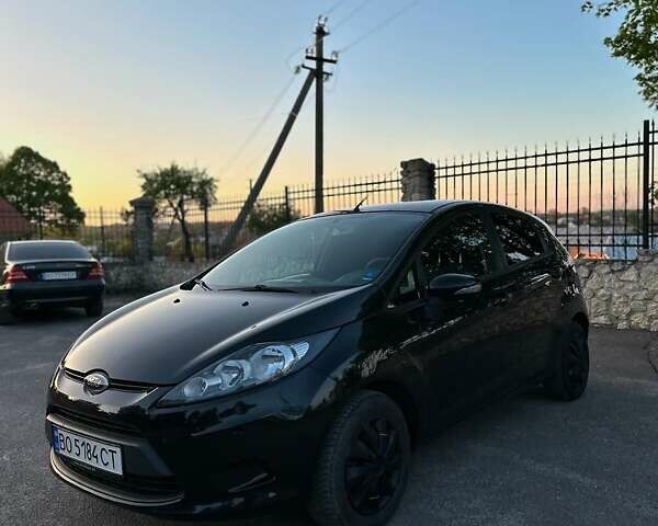 Черный Форд Фиеста, объемом двигателя 1.2 л и пробегом 165 тыс. км за 5900 $, фото 1 на Automoto.ua