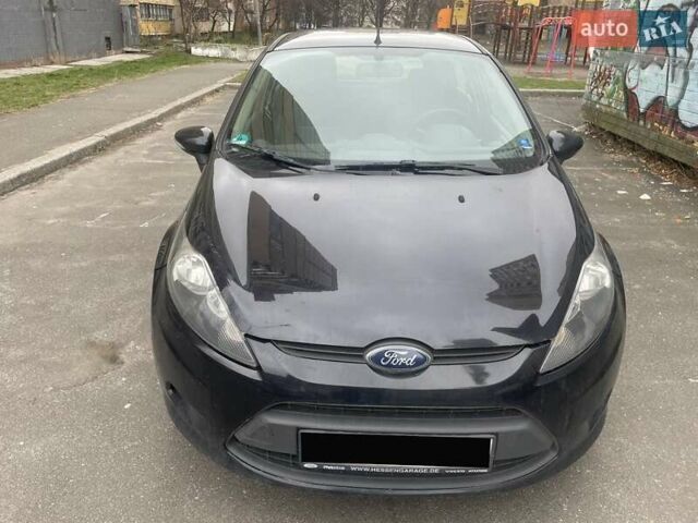 Черный Форд Фиеста, объемом двигателя 1.24 л и пробегом 290 тыс. км за 4600 $, фото 1 на Automoto.ua