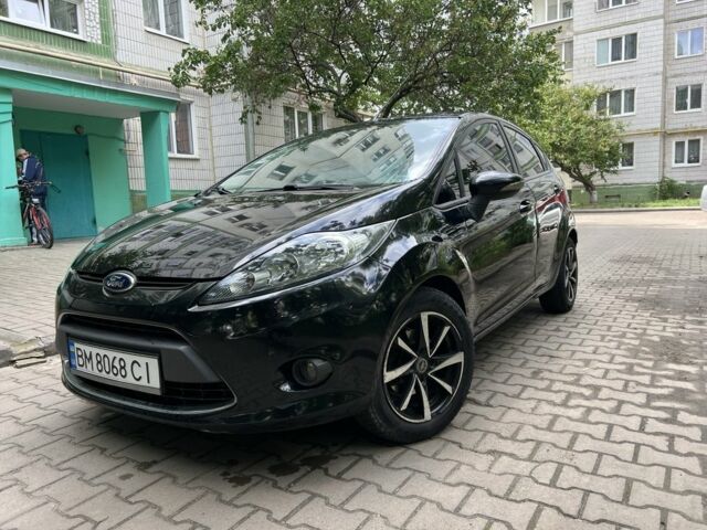Черный Форд Фиеста, объемом двигателя 1.25 л и пробегом 156 тыс. км за 6499 $, фото 1 на Automoto.ua