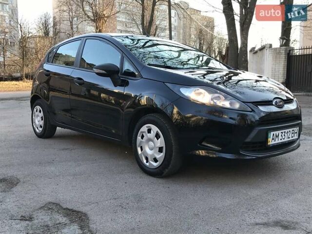 Черный Форд Фиеста, объемом двигателя 1.25 л и пробегом 168 тыс. км за 5900 $, фото 1 на Automoto.ua