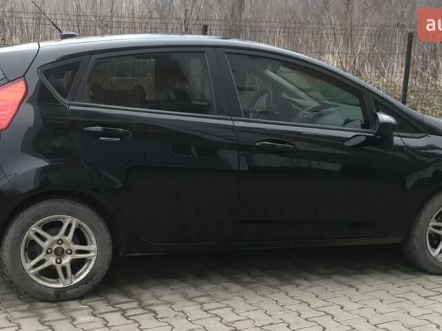 Черный Форд Фиеста, объемом двигателя 1.6 л и пробегом 131 тыс. км за 9300 $, фото 1 на Automoto.ua